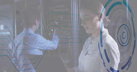 Poster - Image of retina round scanner against diverse male and female engineers working at server room