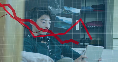 Poster - Image of multiple falling graphs over asian boy playing game on digital tablet