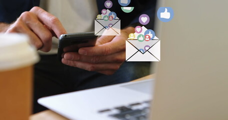Poster - Image of emoji icons over man using smartphone and laptop