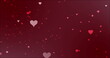 Image of hearts floating over red background
