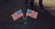 Image of usa flags appearing over timelapse with people walking