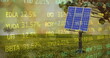 Image of solar panel on grassy field over moving trading board