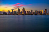 Fototapeta Zwierzęta - Sunset over San Diego skyline viewed from Coronado Island. Long exposure.