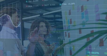 Poster - Image of multiple graphs and trading boards over diverse coworkers sharing ideas in office