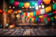  Empty wooden table with Mexican fiesta background out of focus 
