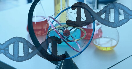 Poster - Two dna structures spinning against close up of laboratory equipment