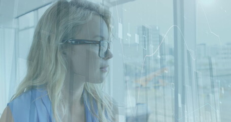 Poster - Image of data processing over caucasian businesswoman in office