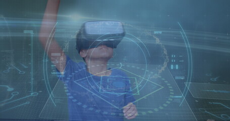 Wall Mural - Image of infographic interface and cells over caucasian boy playing with virtual reality headset