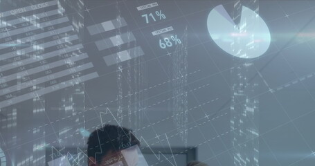 Poster - image of financial graphs and data over caucasian female and male doctors talking
