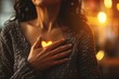 Person clutching their chest due to heartburn, warm lighting, close-up shot 06