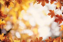 A Frame Of Autumn Leaves With A Blurry Background