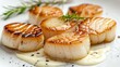   A white plate bears scallops, generously topped and covered in rich sauce, garnished with a single sprig of fragrant rosemary