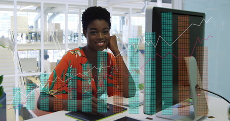 Poster - Image of data processing over african american businesswoman in office