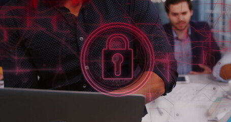 Poster - Image of security padlock and connections over biracial businessman using laptop in office