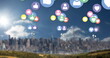 Image of multiple colourful digital social media icons flying over cityscape
