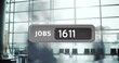 Image of numbers and jobs text over busy office