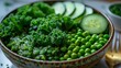   A table displays a bowl of peas, broccoli, sliced cucumbers, and cucumber slices