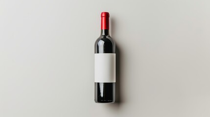 Single red wine bottle isolated on pure white background for elegant presentation