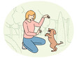 Smiling woman playing with puppy in park. Happy girl have fun learn commands with cute dog in forest. Vector illustration.