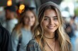 Young woman with a beanie and warm smile in an urban street setting, giving a friendly, easygoing vibe