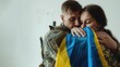 Ukrainian couple who met after the war. military man in uniform hugs his happy wife at home. A wife says goodbye to her husband, leaving him to go to war