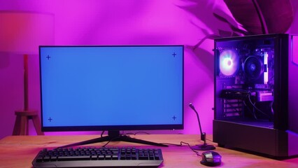 Computer with chroma key green screen on monitor. Gamer man playing in popular video games. Programmer or hacker coding a code and working in networks, cyberspace. Digital software, mobile app