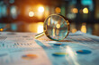 captivating shot of a magnifying glass delicately positioned over documents adorned with intricate analytics data, with selective focus highlighting key details on the table, photo