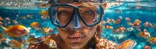 Beautiful Woman Snorkeling Underwater On A Vacation In The Sea