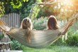 Two adult twins, enjoying a peaceful moment swinging side by side on a backyard hammock