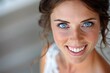 Close-up of the bride's radiant smile, her blue eyes sparkling with happiness and anticipation on her wedding day 01