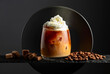 Iced coffee with whipped cream and caramel sauce.