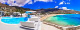 Fototapeta Most - Greek summer holidays. Best beaches of Ios island - Mylopotas with crystal clear waters. Creece, Cyclades.