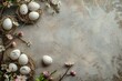 easter background with eggs, nest and blooming branches with copy space, top view