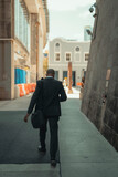 Fototapeta  - man walking in the street business miami 