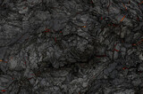 Fototapeta Dmuchawce - Aerial view of the texture of a solidifying lava field
