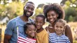 © Pelayo - black patriot family with united states flag. celebrating 4th of july. independence day.