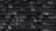 A close-up view showcasing a detailed black textured tile pattern, giving off an industrial and modern aesthetic
