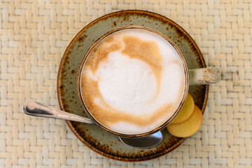 Cup of cappuccino on a table in a cafe. Beautiful foam, white ceramic cup, copy space. 2