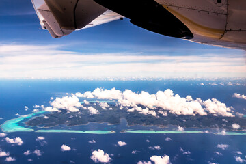 Wall Mural - Bora Bora Island in Tahiti, French Polynesia. Travel, lifestyle, freedom and luxury concept. Aerial view.