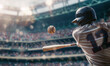 © tjshot - A close-up action shot of a worn baseball mid-flight with dirt particles scattering against a blurred backdrop of a focused batter ready to swing.