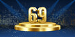 69th Year anniversary celebration background. Golden 3D numbers on a golden round podium, with lights in background.