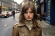 Young caucasian woman serious face on street in 1970s
