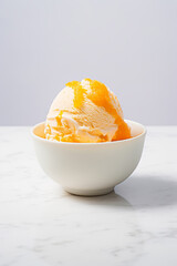 Wall Mural - Orange ice cream in a white bowl on white marble table, summer dessert idea