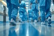Personal de salud, doctores y enfermeros con uniforme quirurgico  azul caminando por los pasillos del hospital despues de terminar su trabajo. Salud