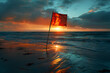 A flag waving in the sunset on the beach, creating a peaceful and patriotic atmosphere. Ideal for vacation and travel-related content.