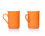 Fototapeta Miasto - orange mugs isolated