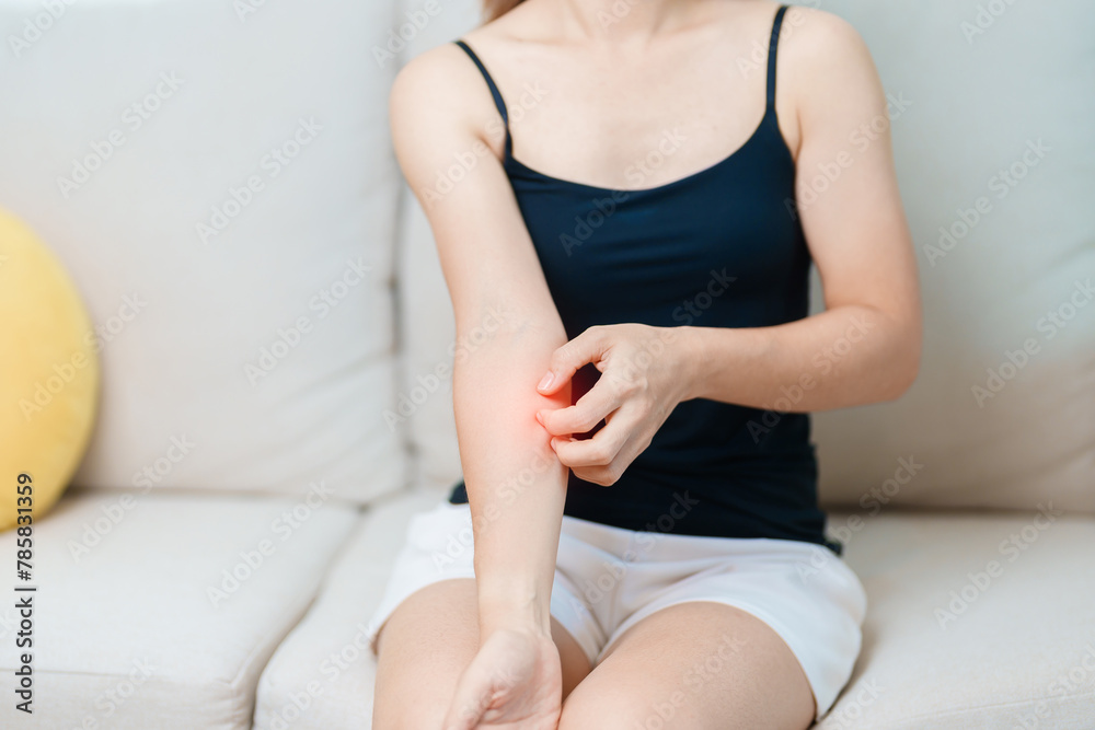 Scratching Reaction woman itching and scratching itchy arm. Sensitive Skin Allergic ...