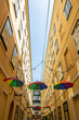 A street in Vienna with suspended umbrellas