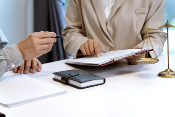 Poster - close up shot of lawyer and business people are discussing business legal