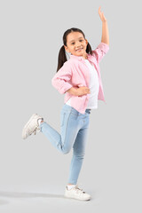 Wall Mural - Portrait of fashionable little girl on white background